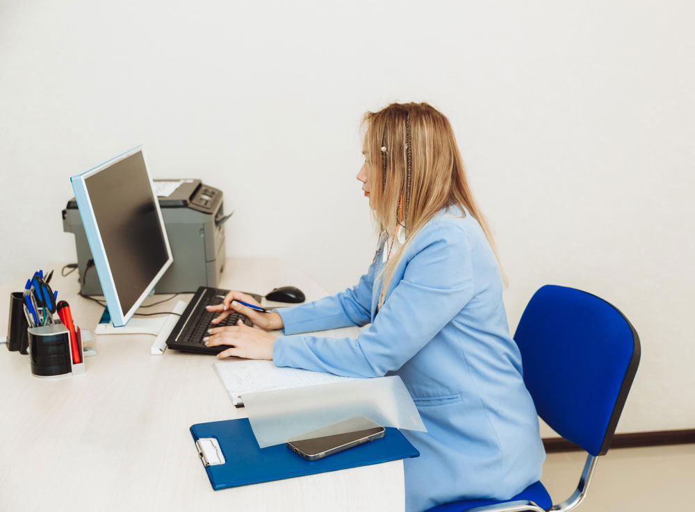 hands-office-woman-typing-keyboard-blonde-woman-working-office